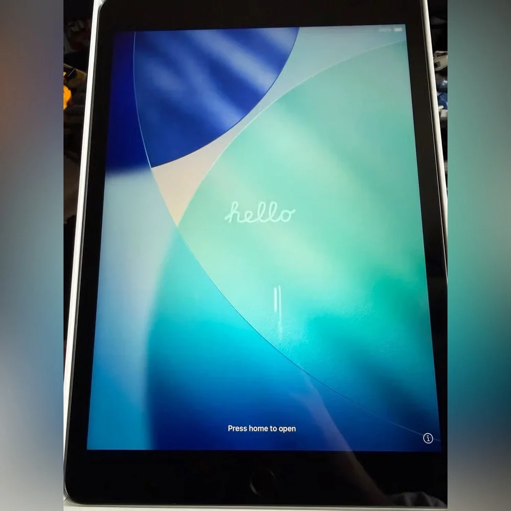 Apple Tablet with Blue and Black Display
